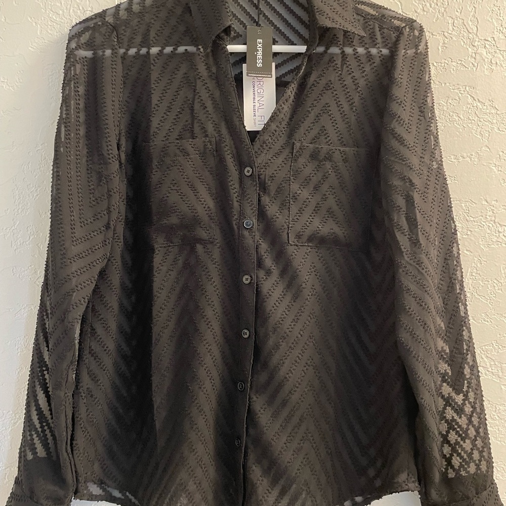 Woman’s sheer black button down